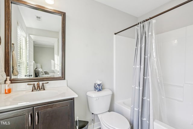 full bathroom with toilet, vanity, and shower / tub combo with curtain