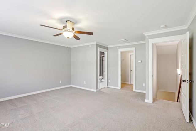 unfurnished bedroom featuring ceiling fan, light carpet, and crown molding