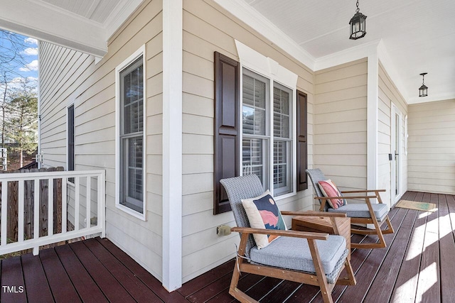 wooden terrace with a porch