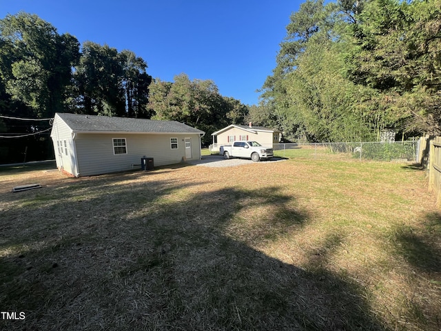 view of yard featuring central AC