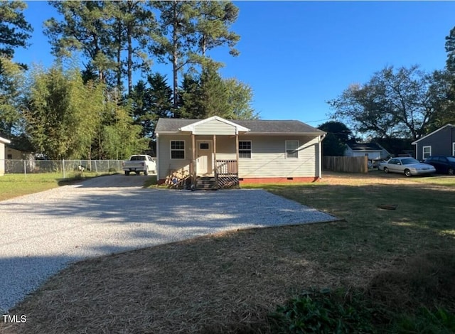 bungalow with a front yard