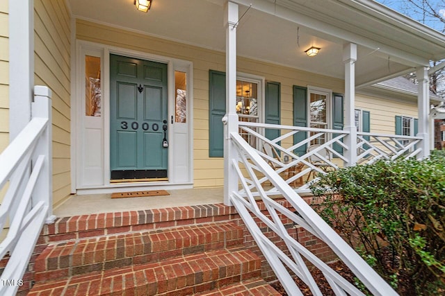 entrance to property with a porch