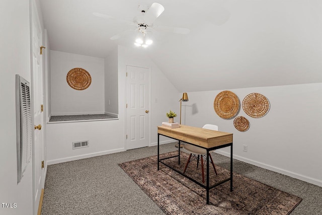 home office featuring lofted ceiling, ceiling fan, and carpet flooring