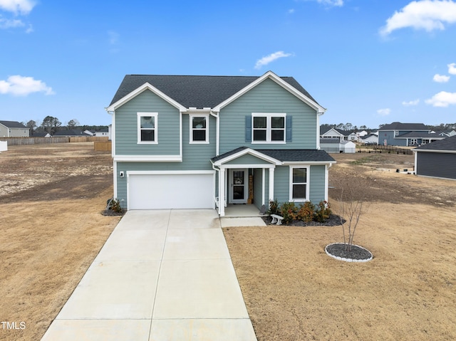 view of front of home with a garage