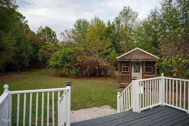 deck featuring a lawn and a shed