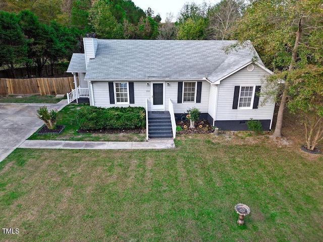 single story home featuring a front lawn