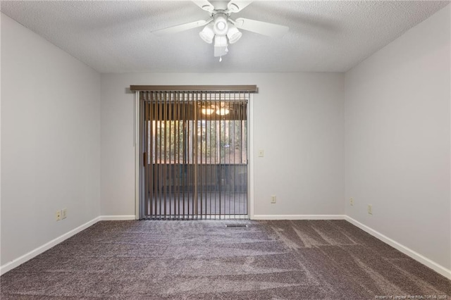 unfurnished room with dark colored carpet, ceiling fan, and a textured ceiling