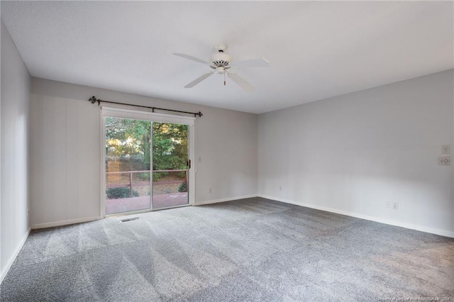 unfurnished room featuring carpet flooring and ceiling fan