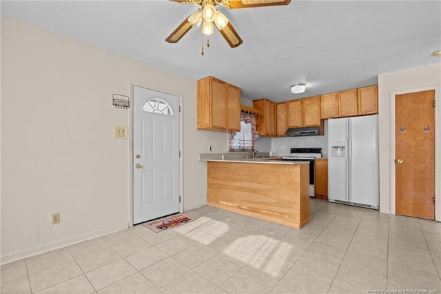 kitchen featuring electric range, white fridge with ice dispenser, ceiling fan, range hood, and kitchen peninsula