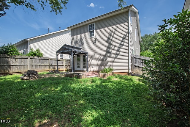 back of house with french doors