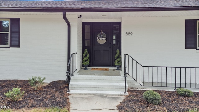 property entrance with covered porch