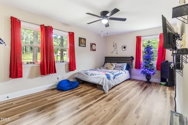 bedroom featuring ceiling fan and light wood-type flooring