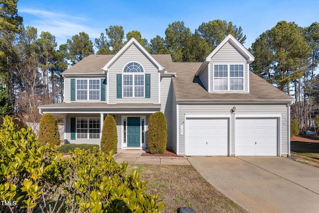 view of front of property featuring a garage