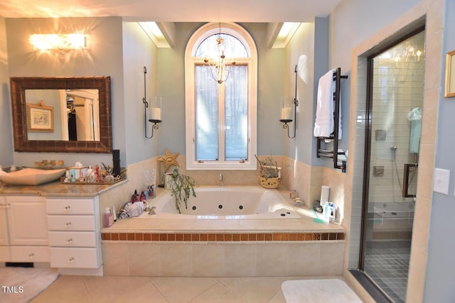 bathroom with vanity, an inviting chandelier, tile patterned flooring, ornamental molding, and shower with separate bathtub