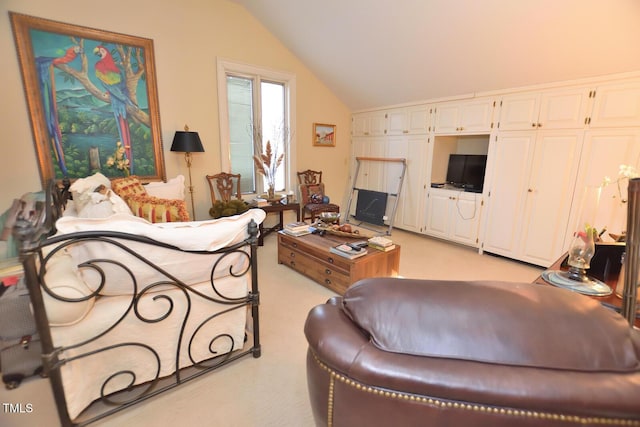 carpeted living room featuring vaulted ceiling