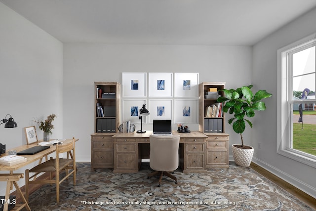 home office featuring baseboards