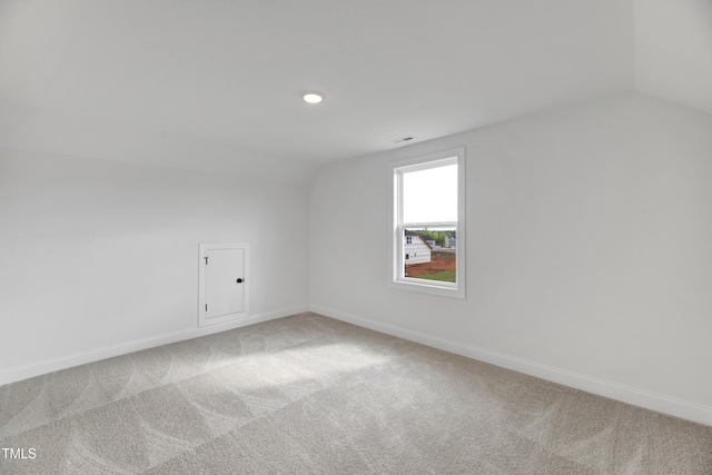 additional living space with lofted ceiling, carpet floors, baseboards, and recessed lighting