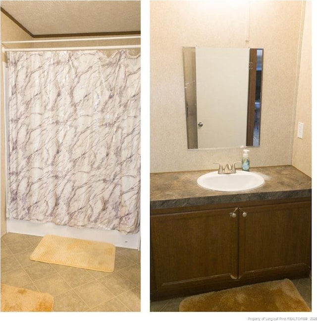 full bathroom featuring a textured ceiling, shower / tub combo, vanity, and tile patterned floors