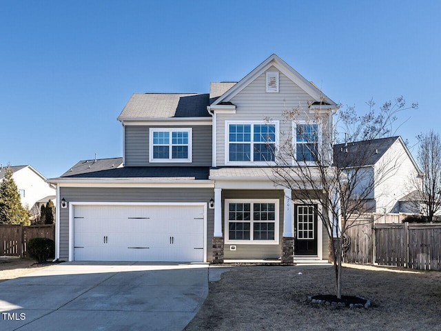 craftsman house with a garage