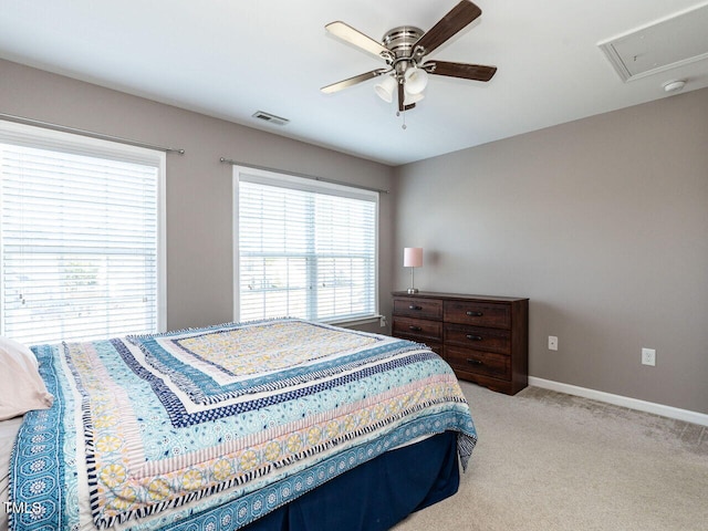 carpeted bedroom with ceiling fan