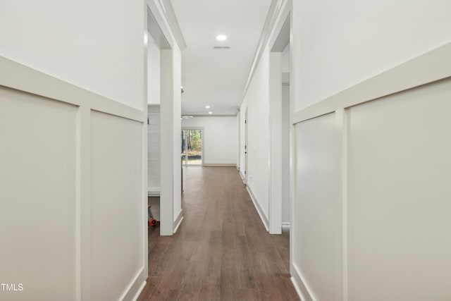 hall featuring dark wood-type flooring