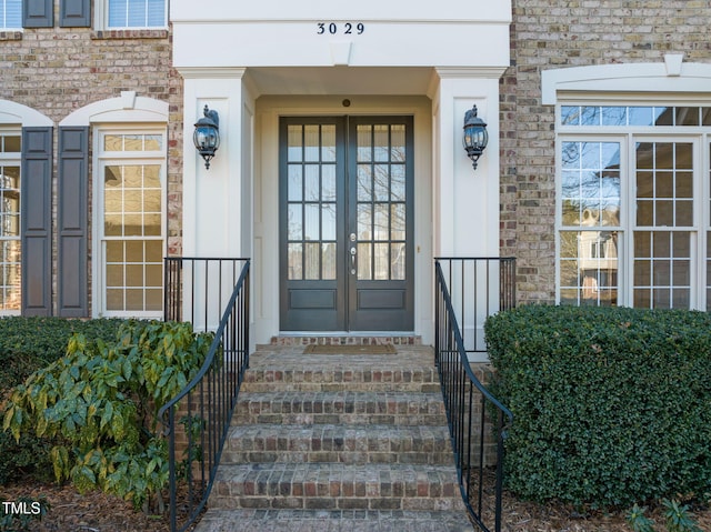 entrance to property featuring french doors