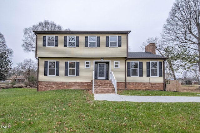 view of front of house with a front yard