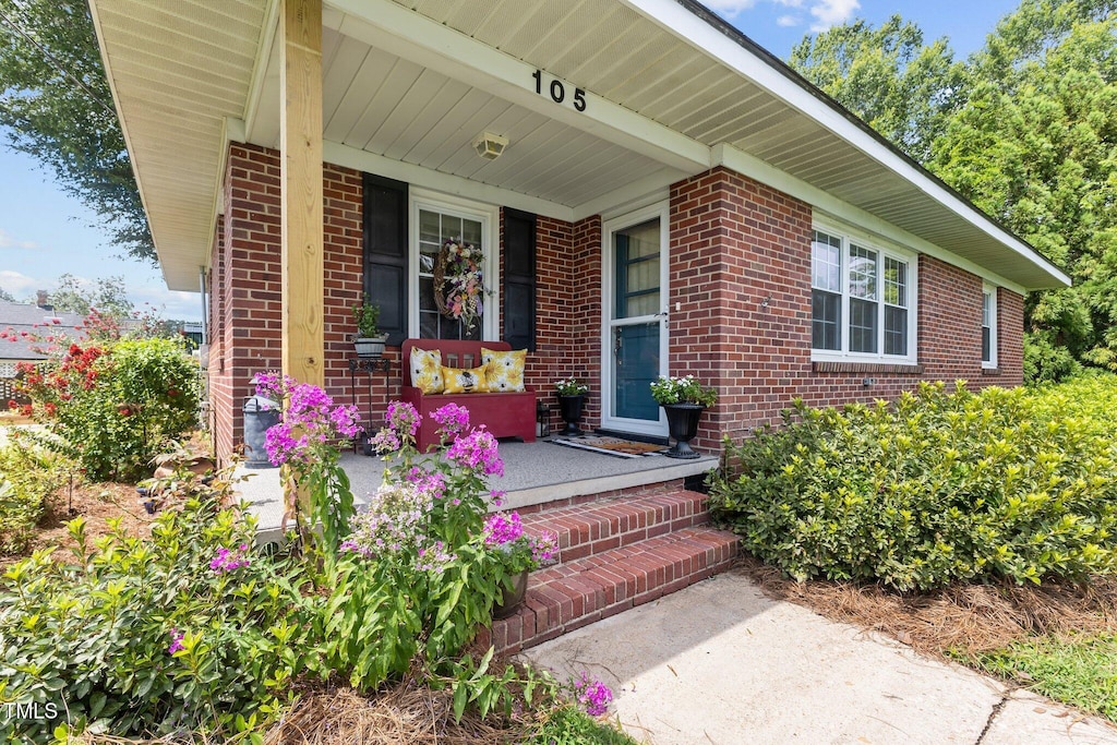 entrance to property with covered porch