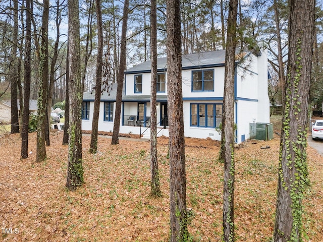 view of front of home featuring central air condition unit