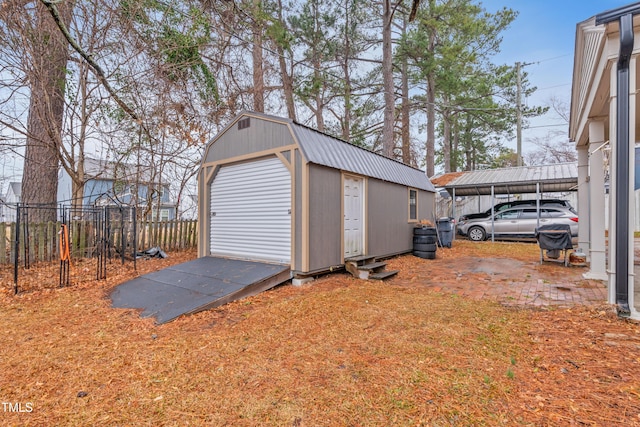 garage featuring a carport