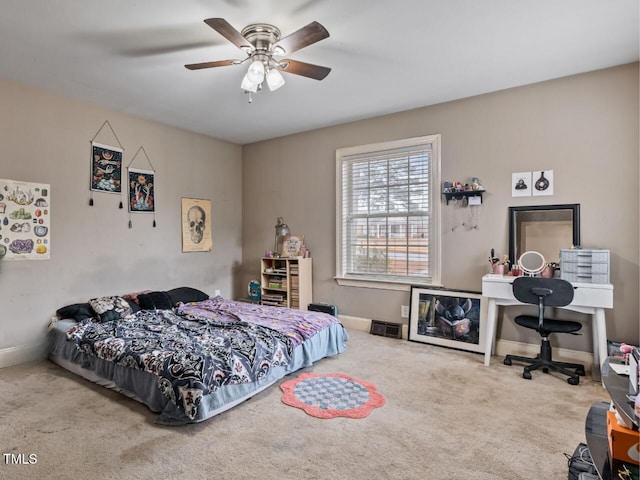 bedroom featuring ceiling fan and carpet flooring