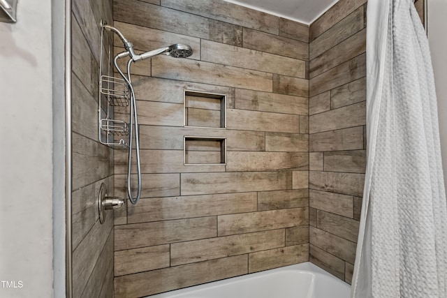 bathroom featuring shower / tub combo with curtain