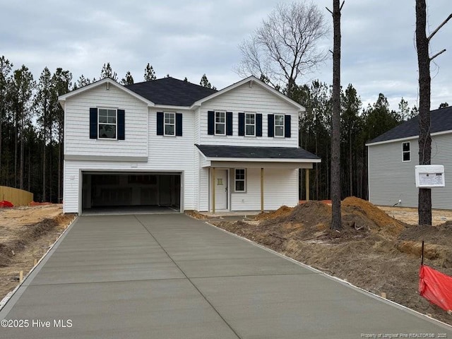 view of front property with a garage