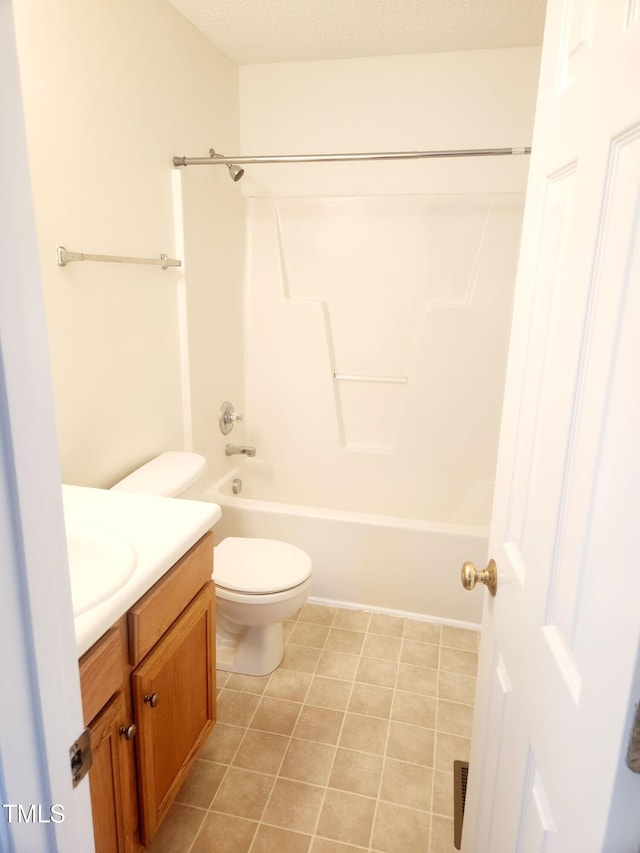 full bathroom featuring a textured ceiling, vanity, shower / bathtub combination, and toilet