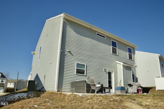 back of property featuring a patio area