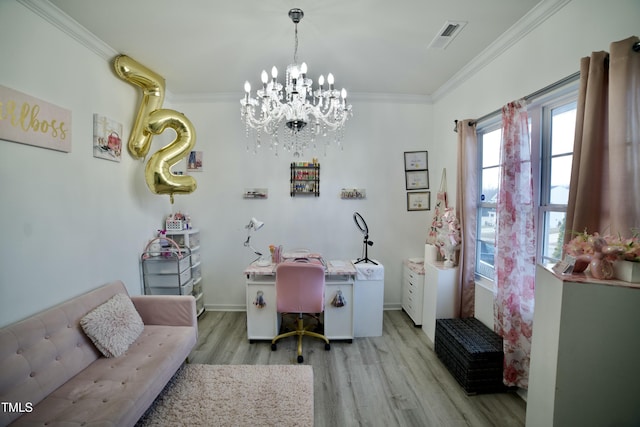 home office featuring light hardwood / wood-style flooring, ornamental molding, and a notable chandelier