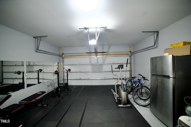 garage featuring stainless steel refrigerator