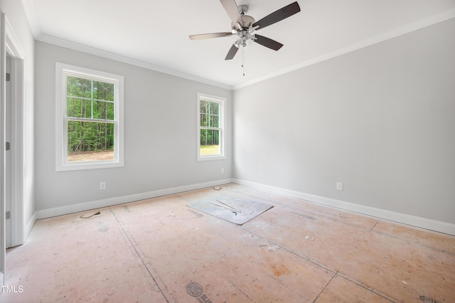 unfurnished room with crown molding, baseboards, and a ceiling fan