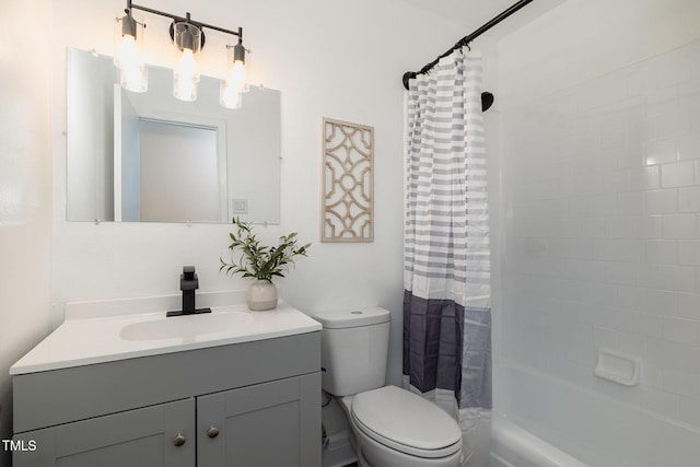 full bathroom with vanity, toilet, and shower / bathtub combination with curtain