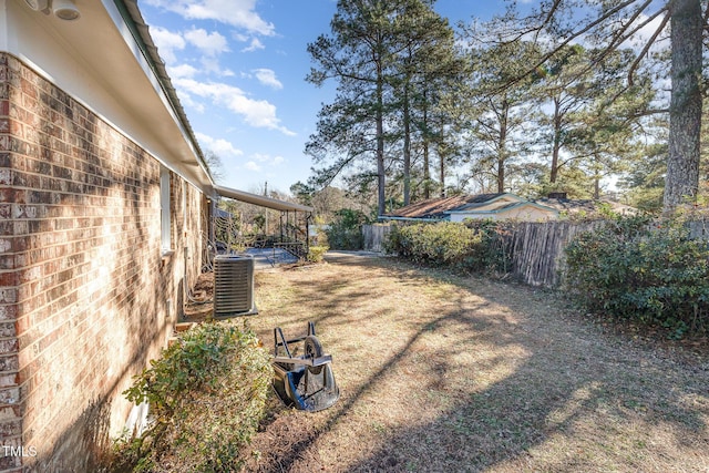 view of yard featuring central AC unit