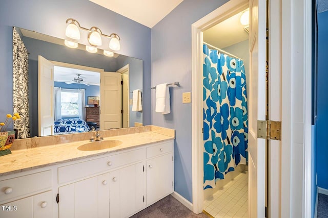 bathroom featuring vanity and ceiling fan