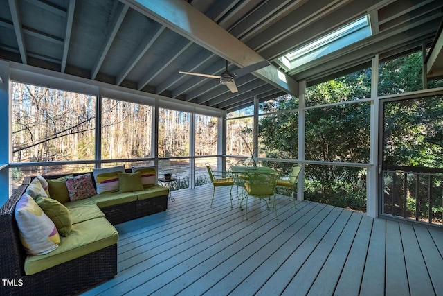 unfurnished sunroom featuring vaulted ceiling