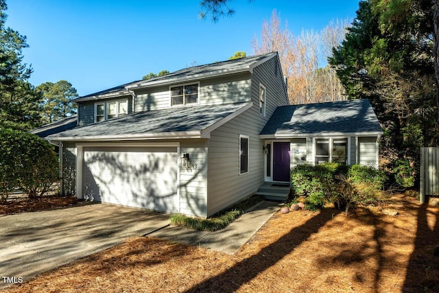 front of property featuring a garage