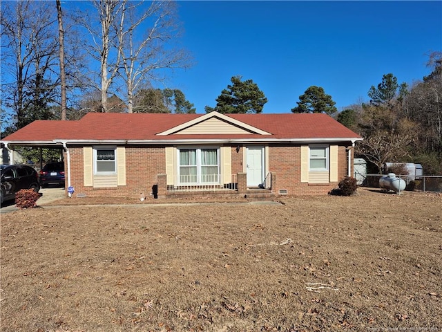 single story home with a carport