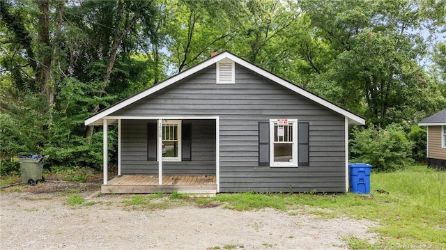 view of home's exterior featuring covered porch