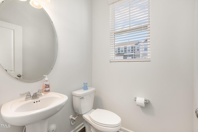 bathroom with sink and toilet