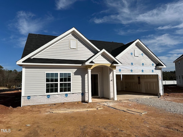 view of front of property with a garage