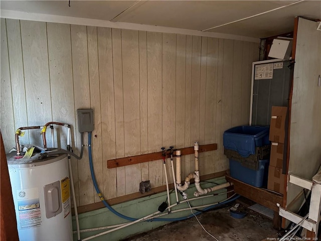 utility room with electric water heater