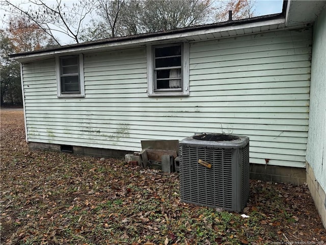 view of property exterior featuring central AC