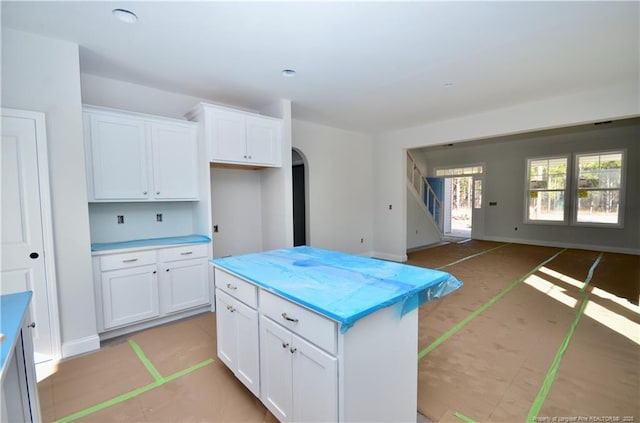 kitchen featuring white cabinetry and a center island